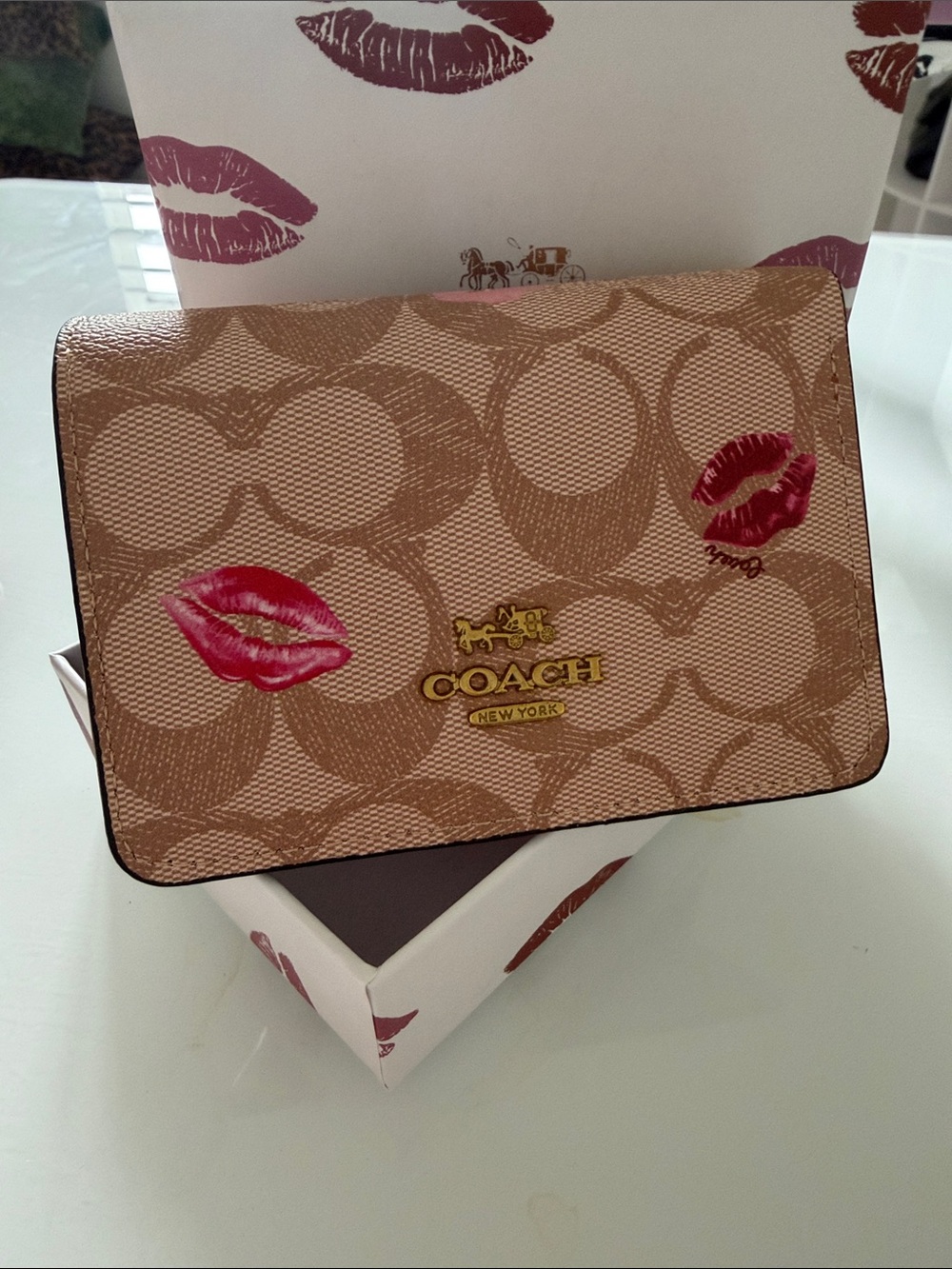 COACH Tan Signature Kiss Print Crossbody with Gold Logo